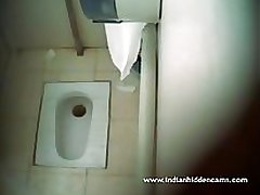 Indian babe filmed naked in public toilet - indianhiddencams.com